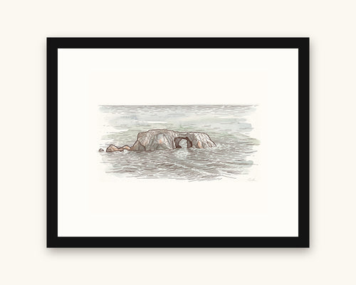 Framed watercolor print of Arched Rock on the Sonoma Coast, with a white mat in a black frame