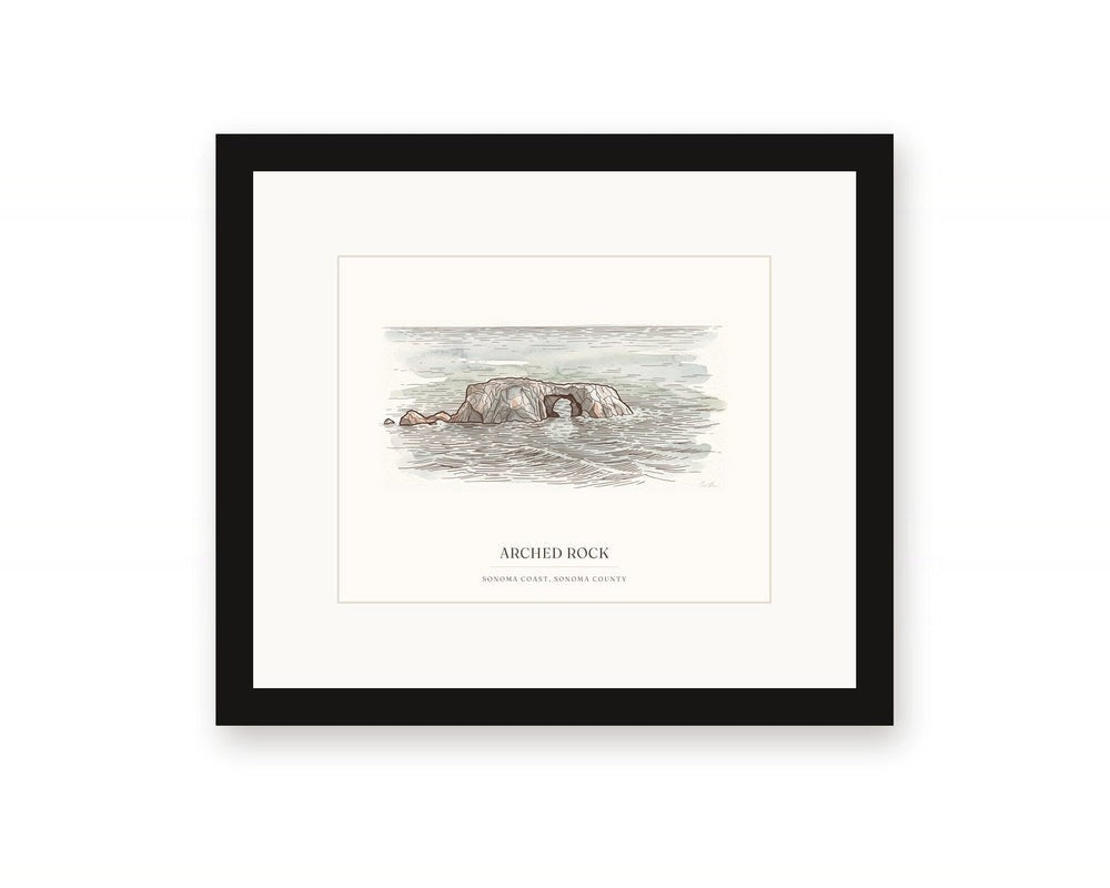Framed watercolor print of Arched Rock on the Sonoma Coast, with a white mat in a black frame