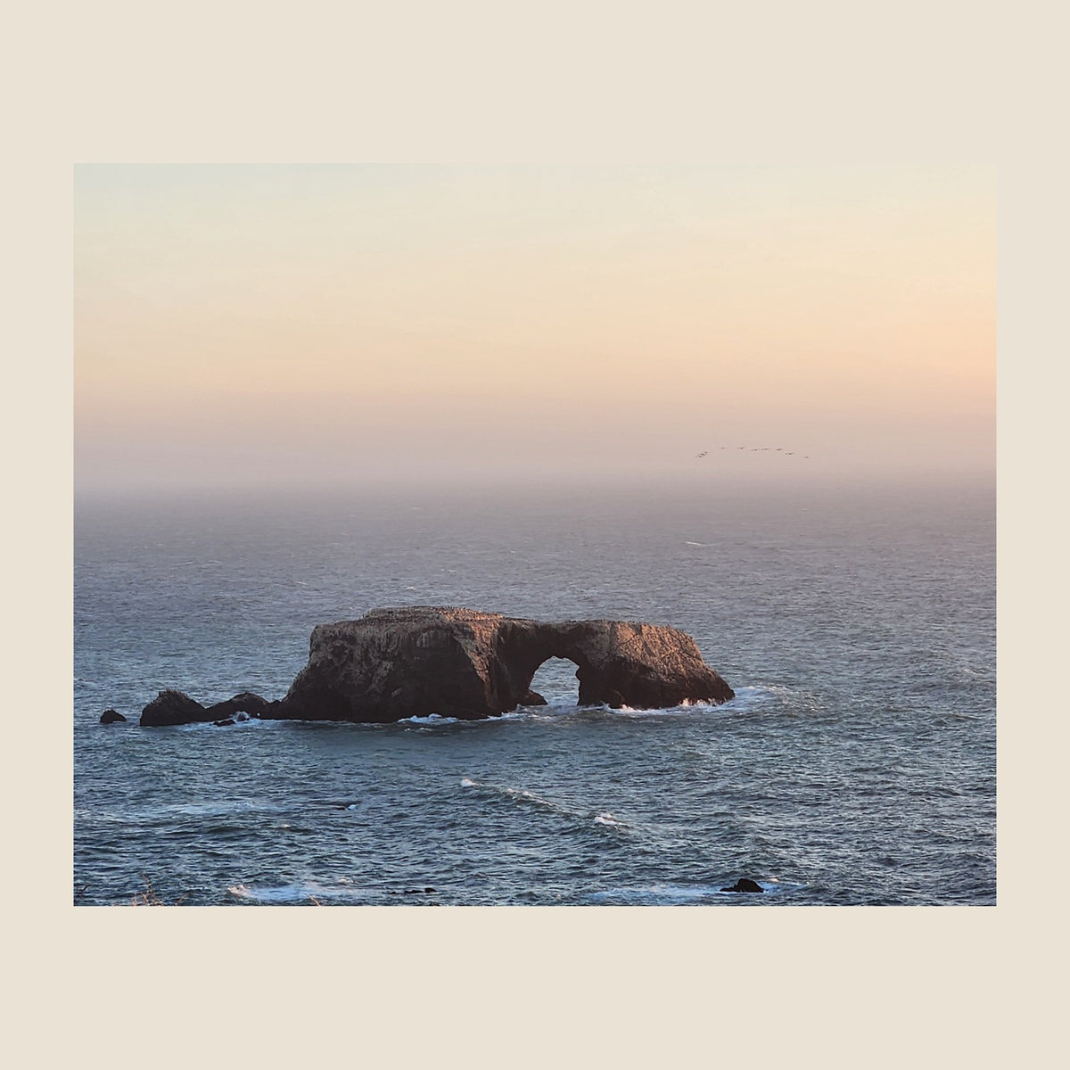 Center panel of the Arched Rock framed set: Noah's evening photograph of Arched Rock from the Highway 1 bluffs, shown large