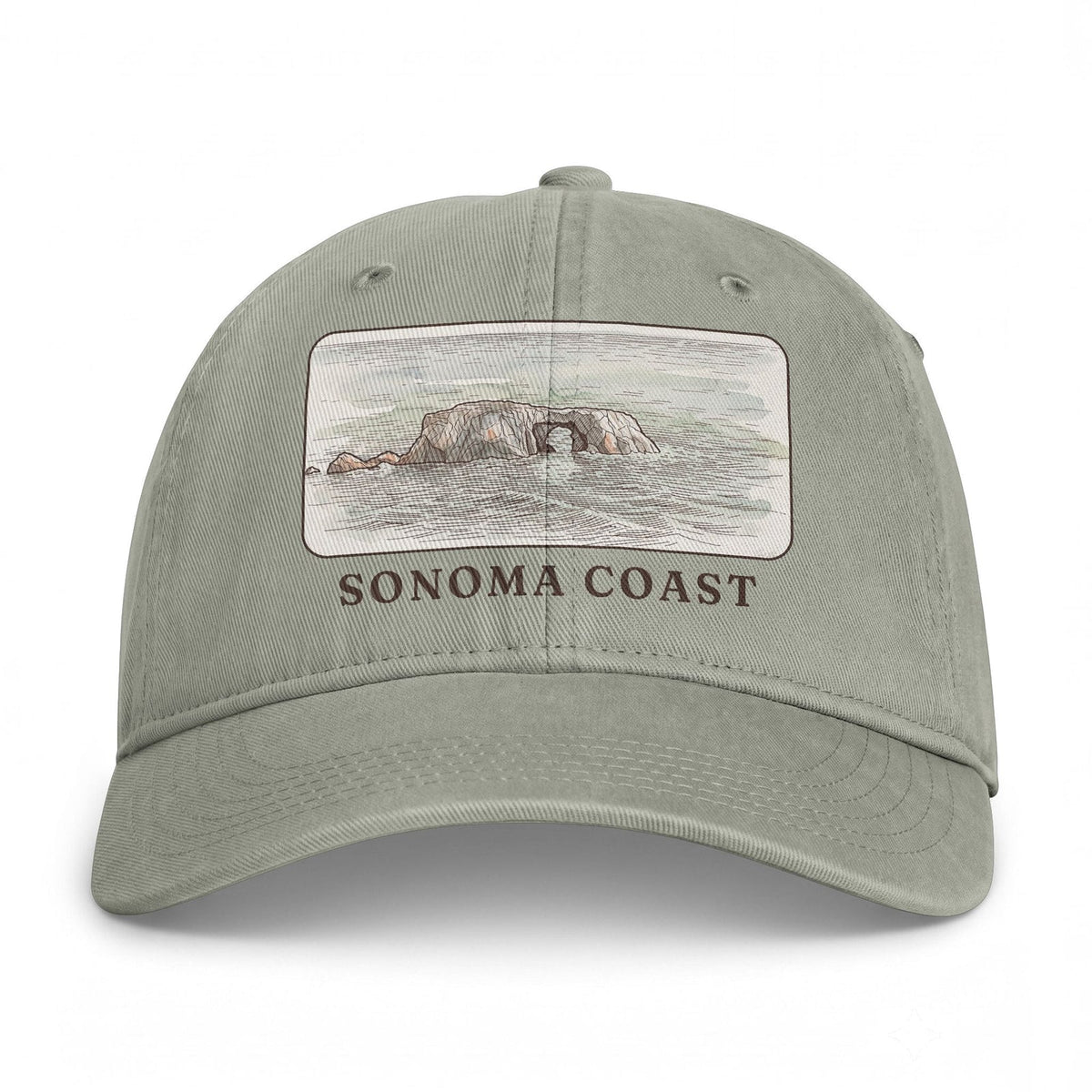 Sandstone washed cap with the Arched Rock watercolor panel and SONOMA COAST
