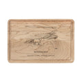 Maple cutting board engraved with a line drawing of a calf on a pasture above Bodega Bay
