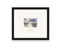 Framed watercolor print of sunrise over Bodega Harbor, with a white mat in a black frame