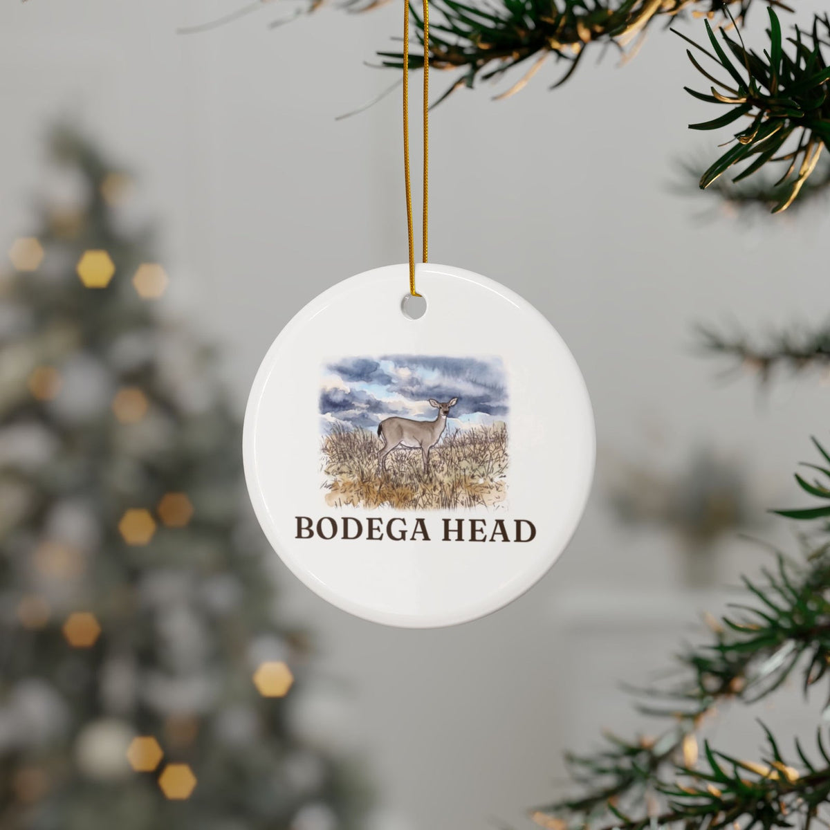 Bodega Head deer ornament hanging on a Christmas tree