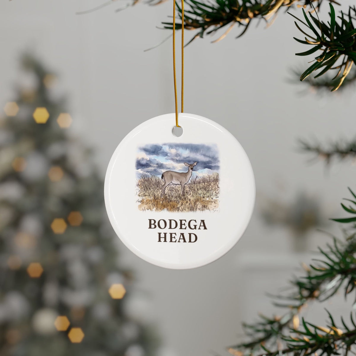 Bodega Head deer ornament hanging on a Christmas tree