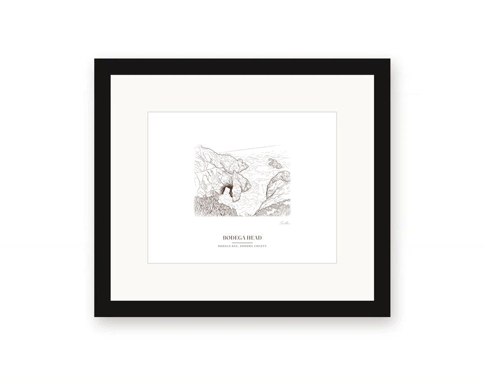 Framed ink drawing print of the sea arch at Bodega Head, with a white mat in a black frame