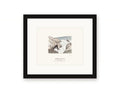 Framed watercolor print of the sea arch at Bodega Head, with a white mat in a black frame