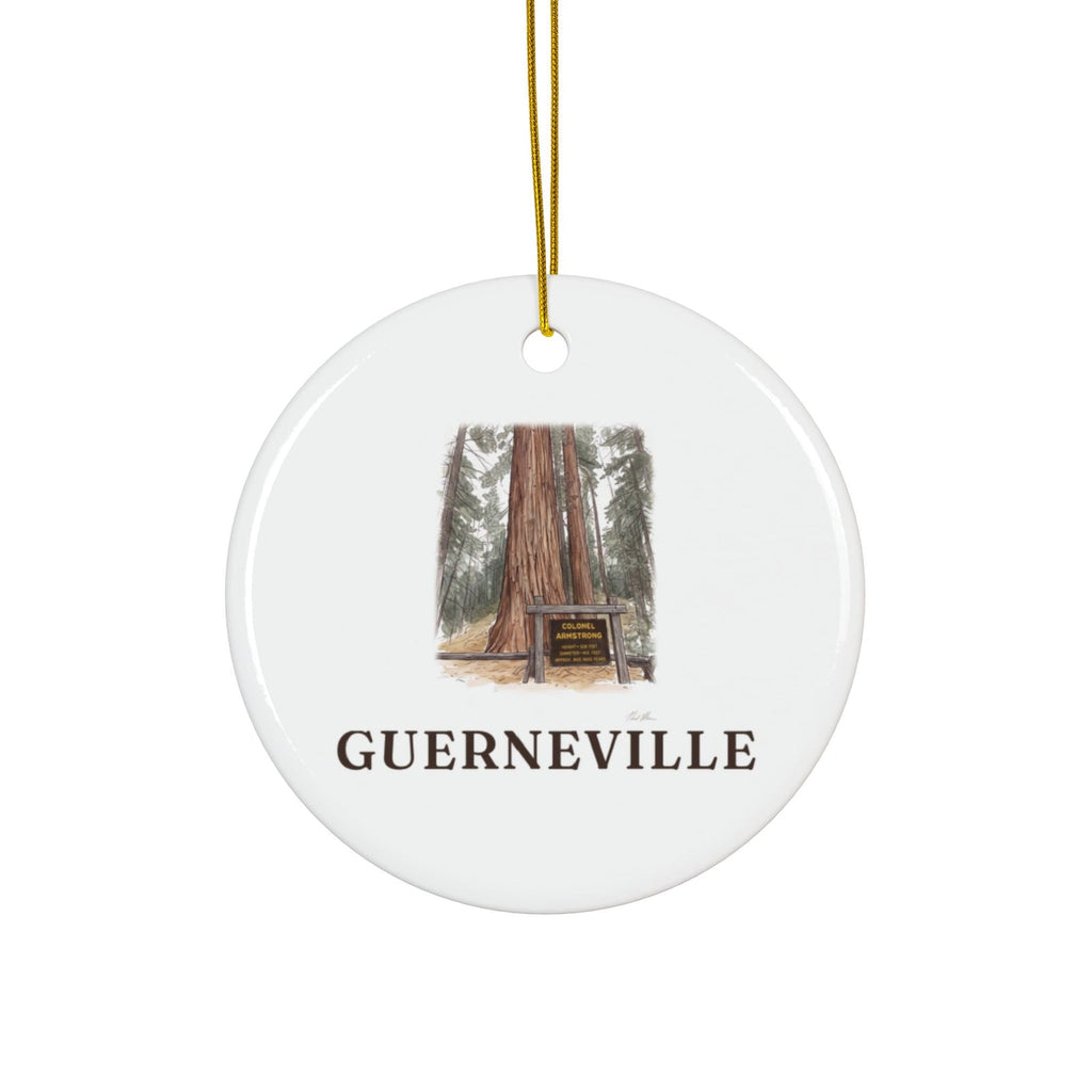 Round ceramic ornament with the Colonel Armstrong Tree in watercolor and the place name Guerneville