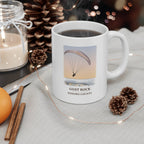 Paraglider over Goat Rock mug on a holiday coffee table