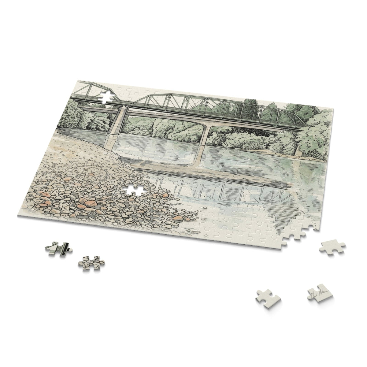 Guerneville Bridge puzzle nearly finished with loose pieces on the table