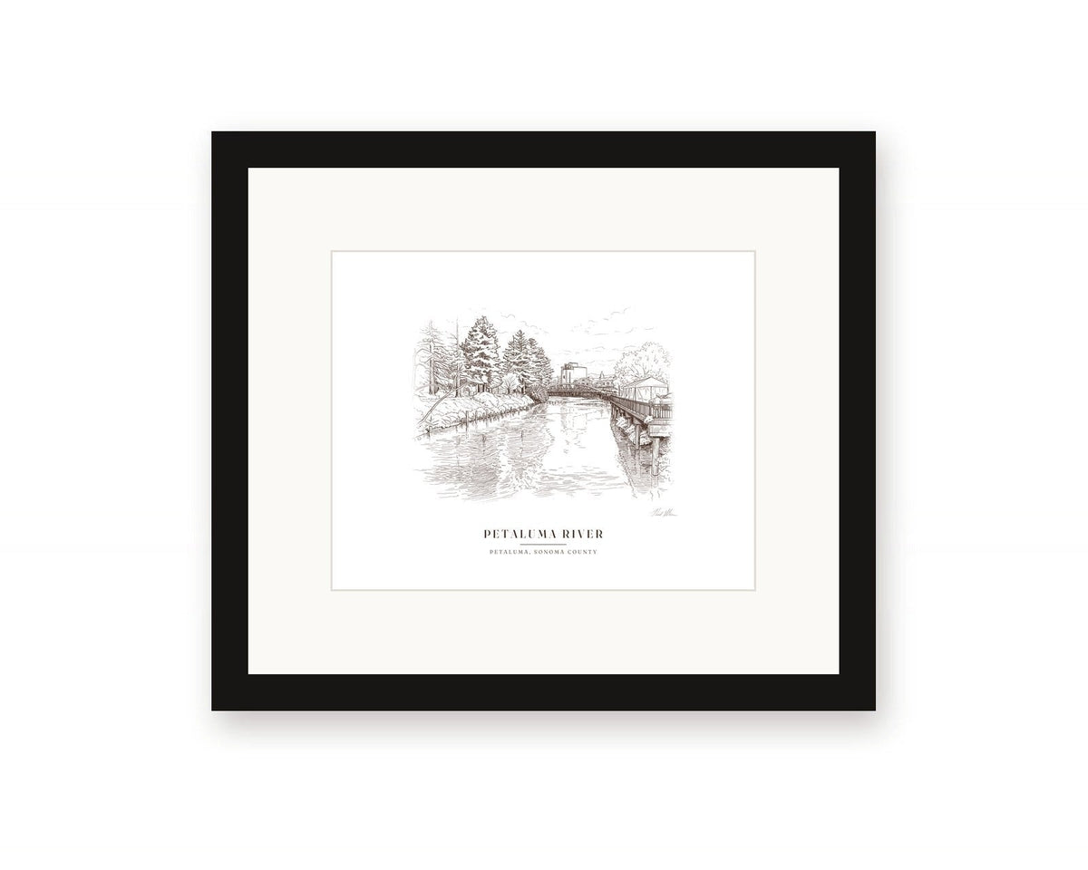 Framed ink drawing print of the Petaluma River in downtown Petaluma, with a white mat in a black frame