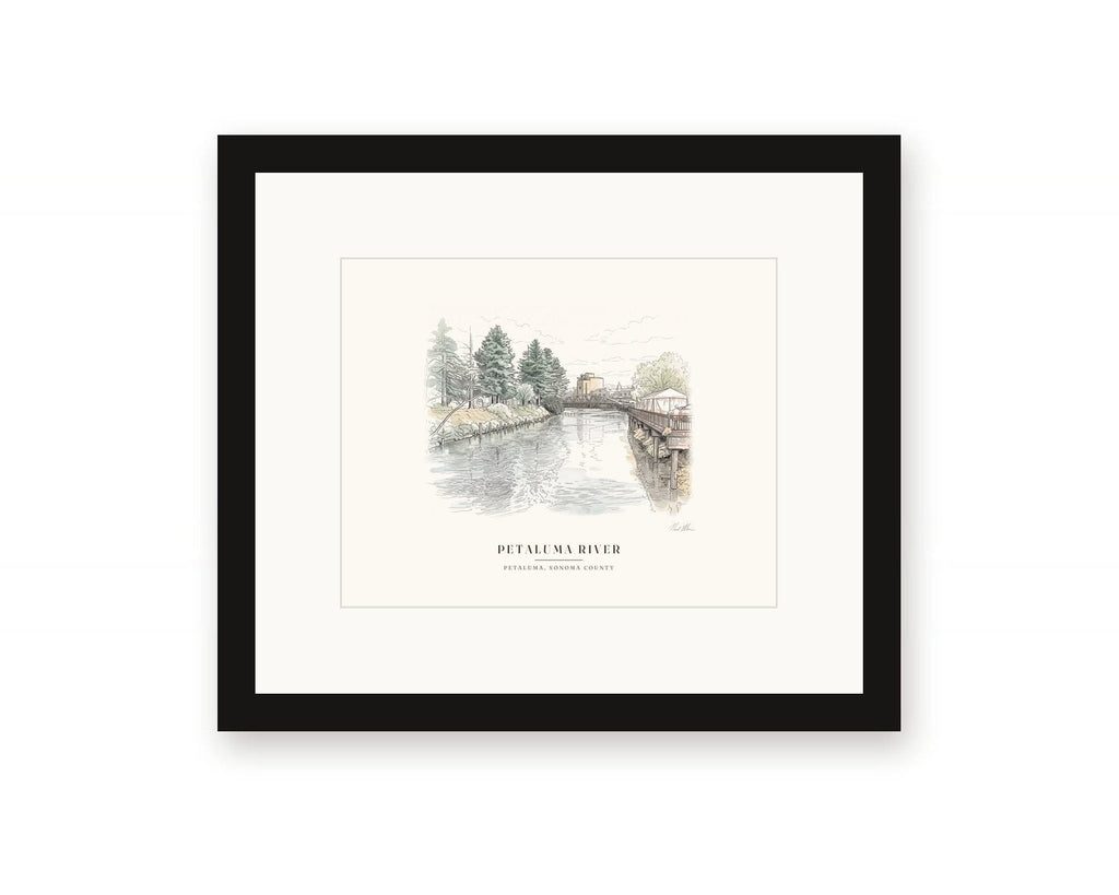 Framed watercolor print of the Petaluma River in downtown Petaluma, with a white mat in a black frame