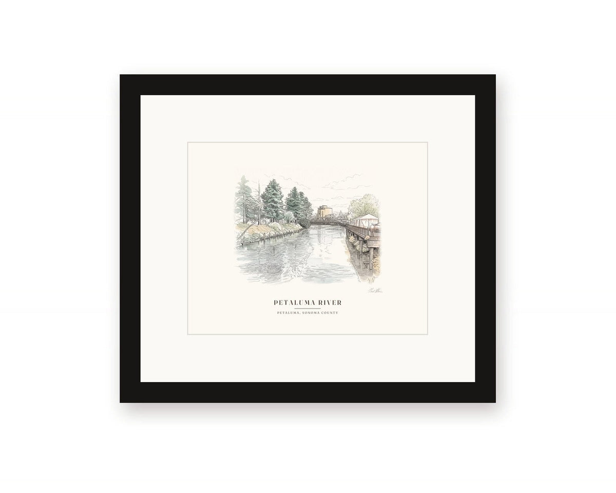 Framed watercolor print of the Petaluma River in downtown Petaluma, with a white mat in a black frame