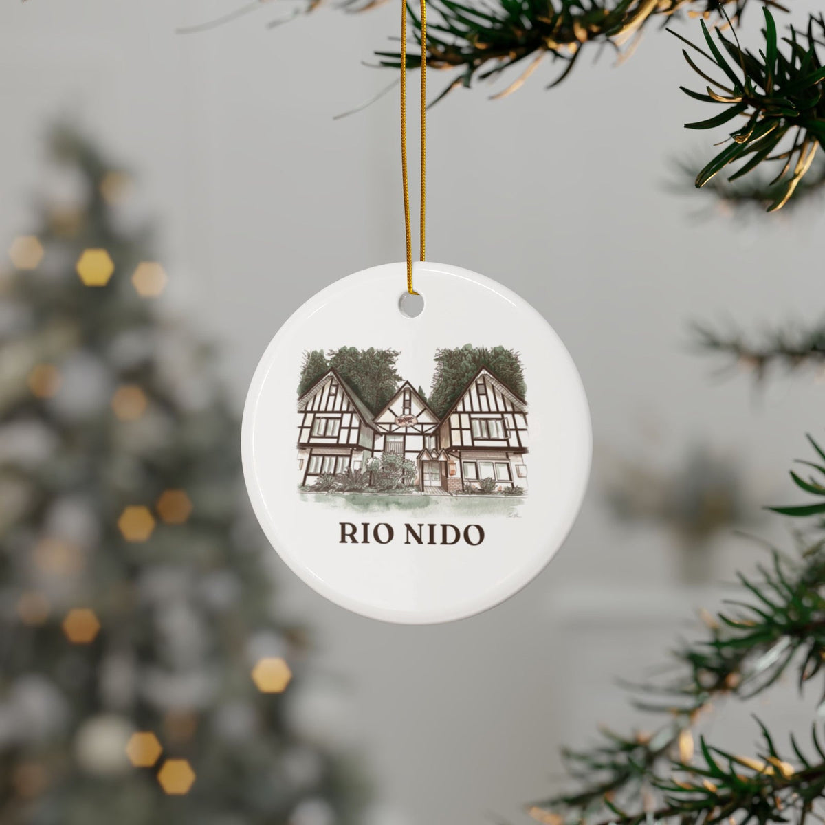 Rio Nido Tudor Lodge ornament hanging on a Christmas tree