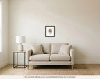 8 x 10 in framed Rio Nido sign watercolor hanging over a 60 inch loveseat, shown to scale