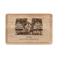 Maple cutting board engraved with a line drawing of the Tudor lodge in Rio Nido, Russian River