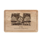 Maple cutting board engraved with a line drawing of the Tudor lodge in Rio Nido, Russian River