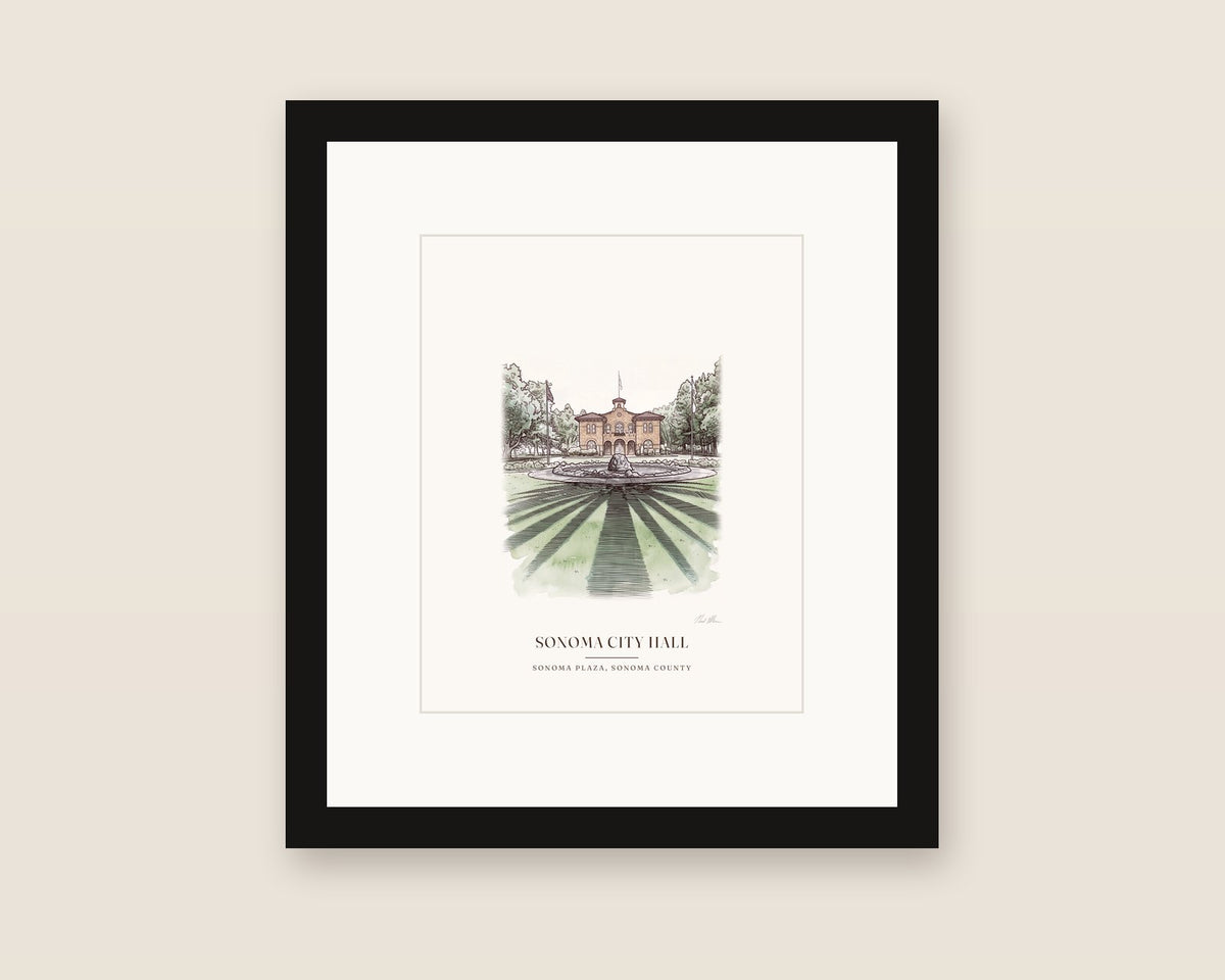 Framed watercolor print of Sonoma City Hall, the stone building at the center of the Sonoma Plaza, with its sign over the front door, with a white mat in a black frame