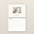 August: the sea arch at Bodega Head, above the August 2027 date grid