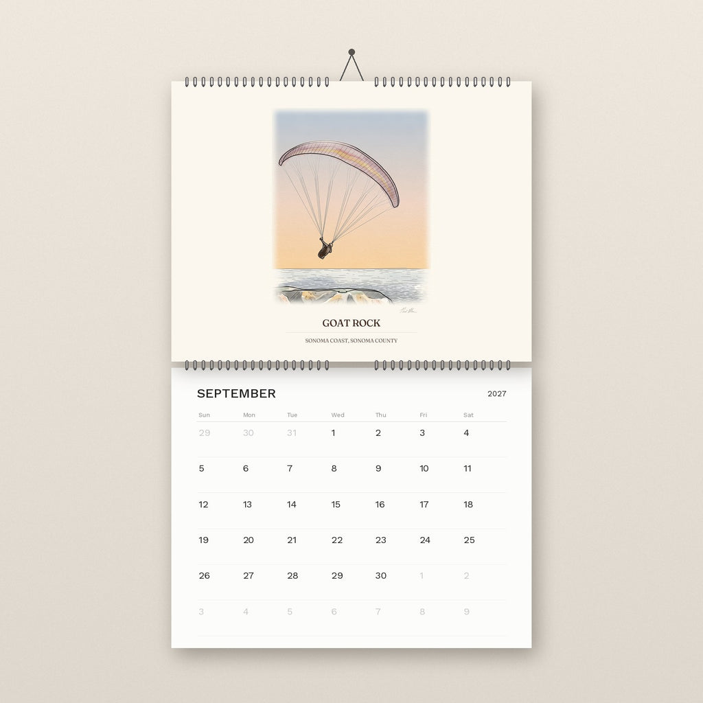 September: a paraglider over Goat Rock, above the September 2027 date grid