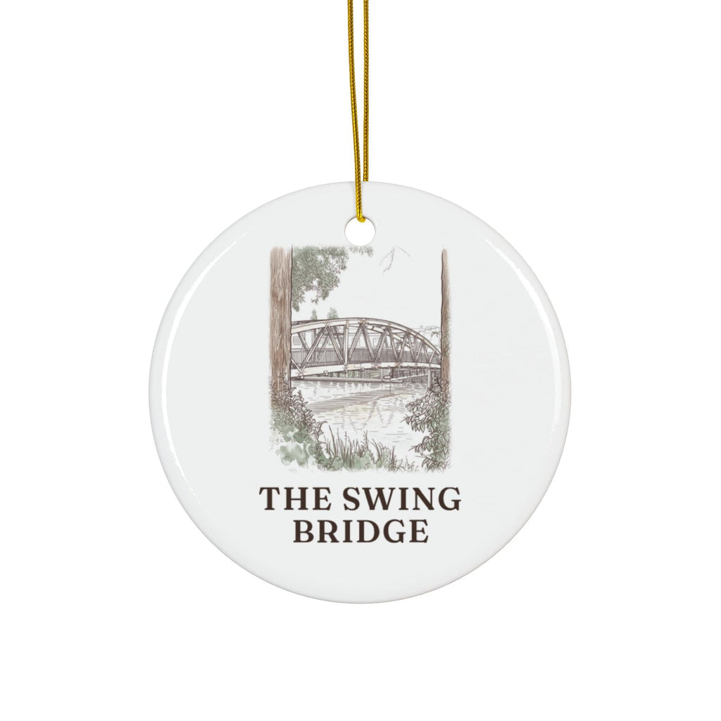 Round ceramic ornament with the Swing Bridge in watercolor and the place name