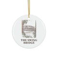 Round ceramic ornament with the Swing Bridge in watercolor and the place name