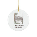 Round ceramic ornament with the Swing Bridge in watercolor and the place name
